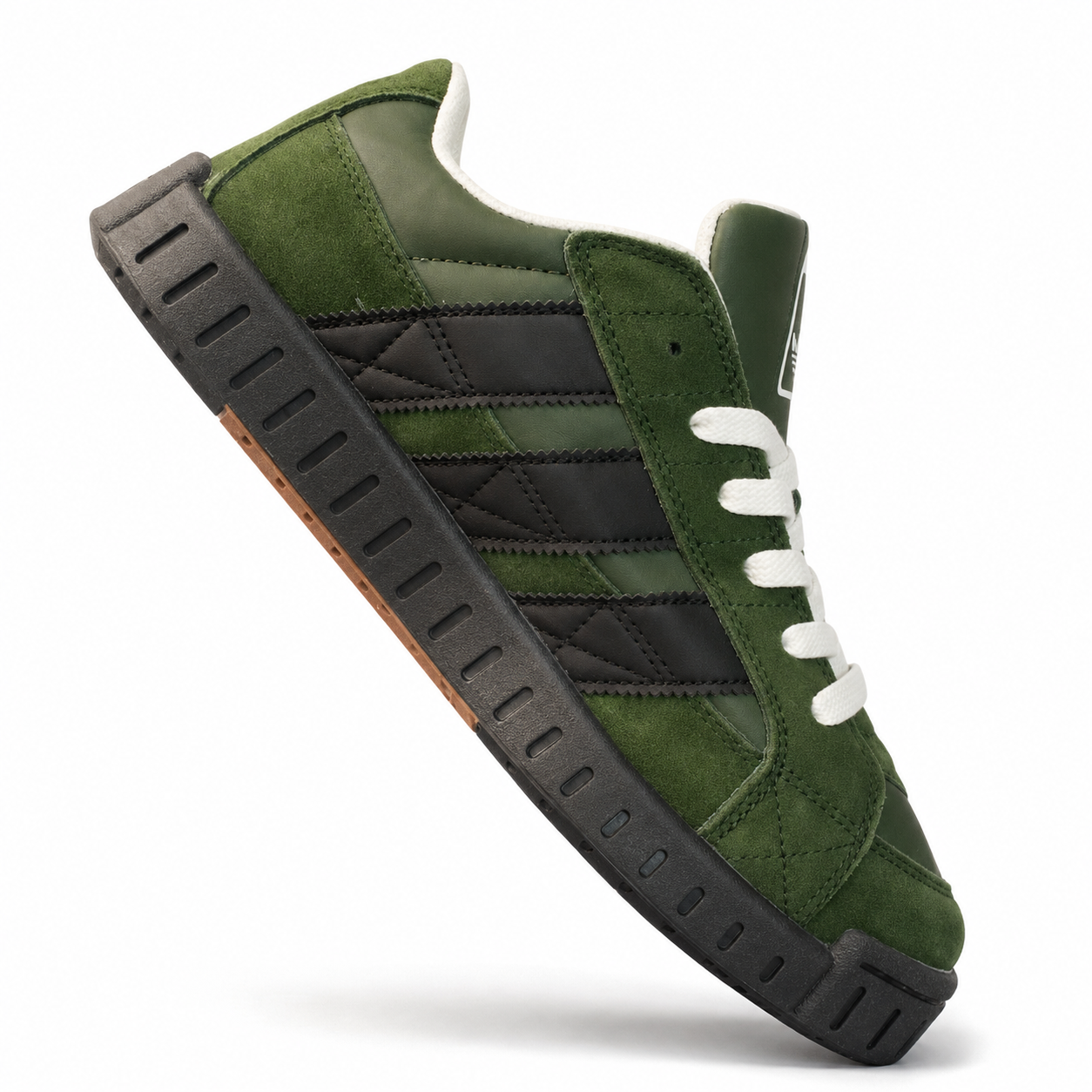 Green and black low-top sneaker on a white background