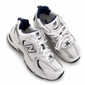 New Balance white mesh athletic shoes on a white background